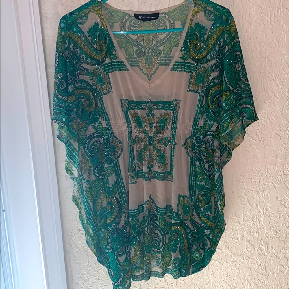 Green patterned blouse